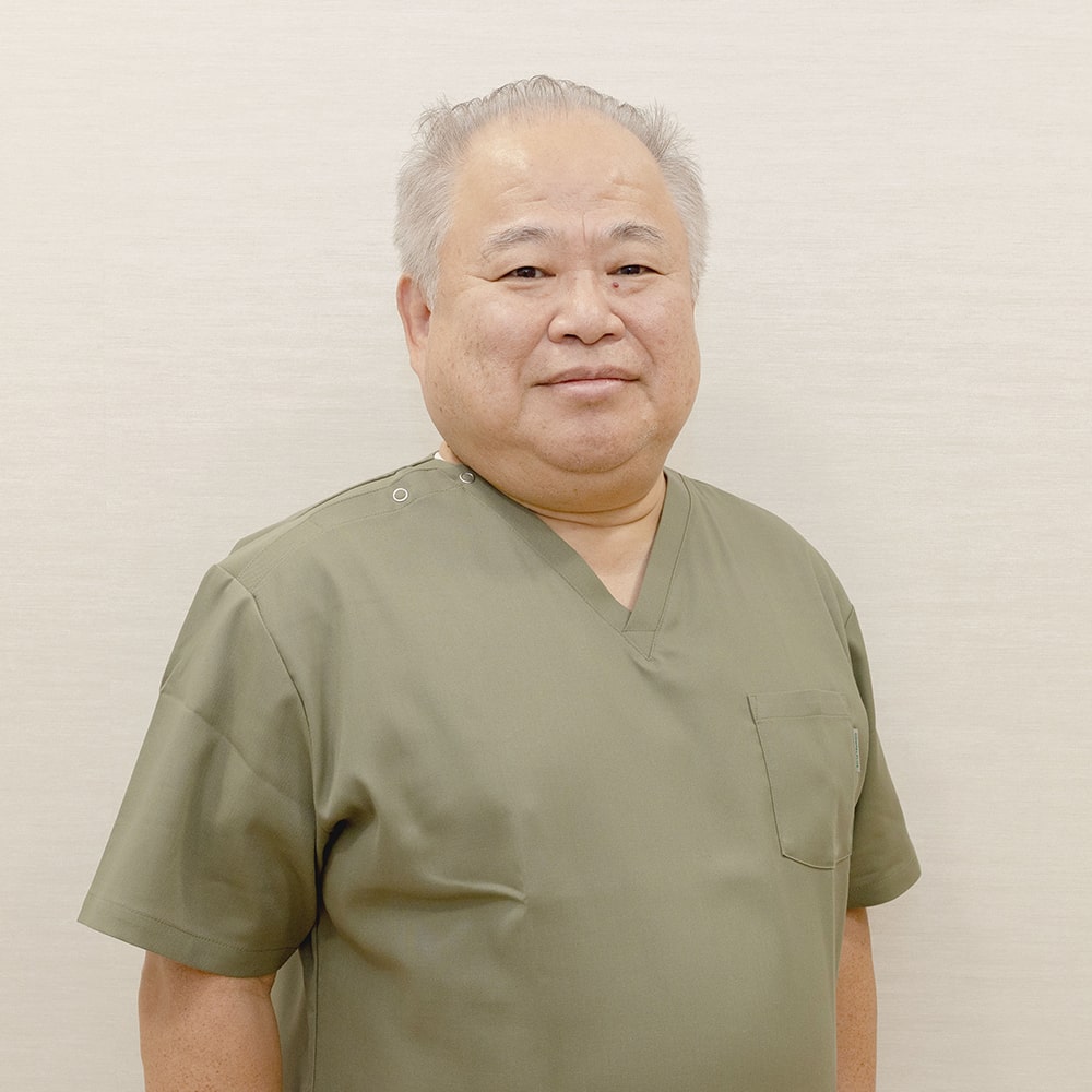 歯科医師　金澤 篤